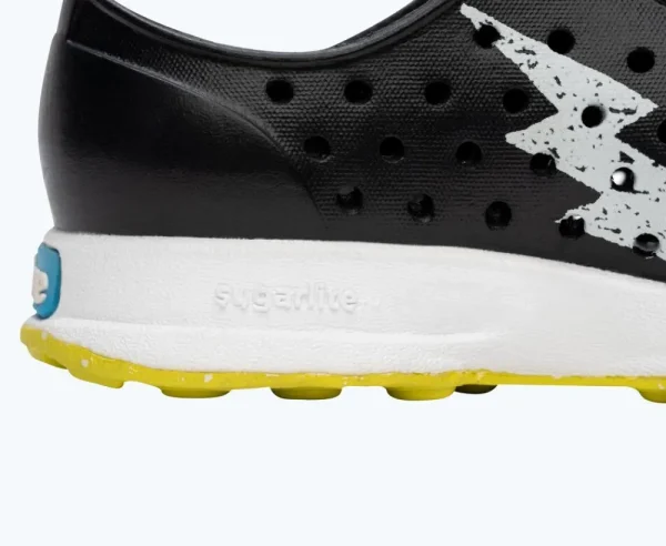 robbie_sugarlite_glow_chi_4.webp Native Shoes Shoes^Robbie Sugarlite Glow Child Jiffy Black/ Shell White/ Shell Lightning Glow/ Pickle Speckle Rubber